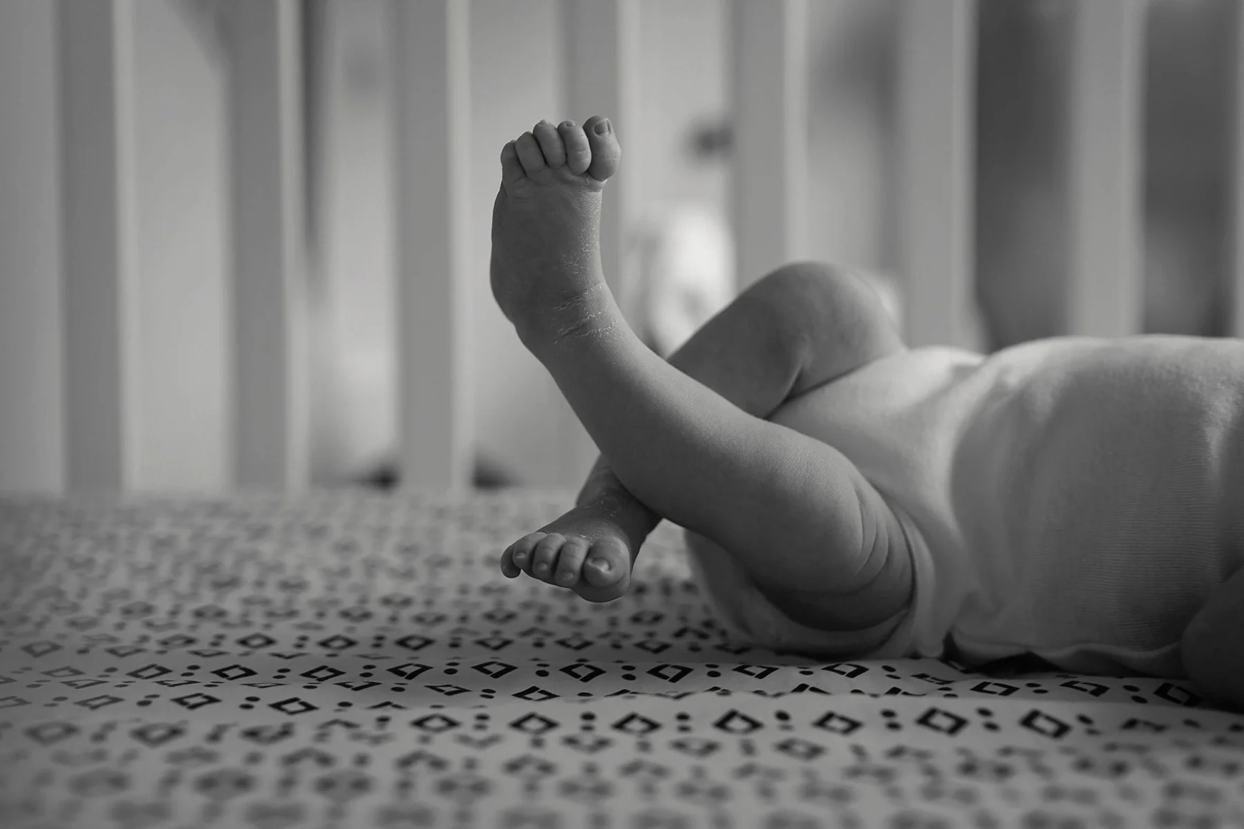 newborn_toes_in_crib.jpg