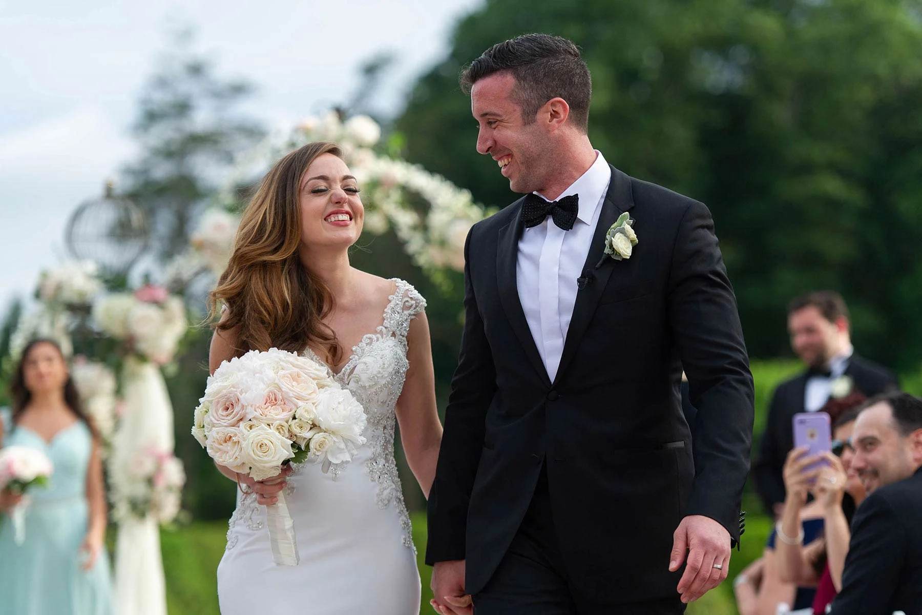 24_bride_and_groom_walk_down_the_aisle.jpg