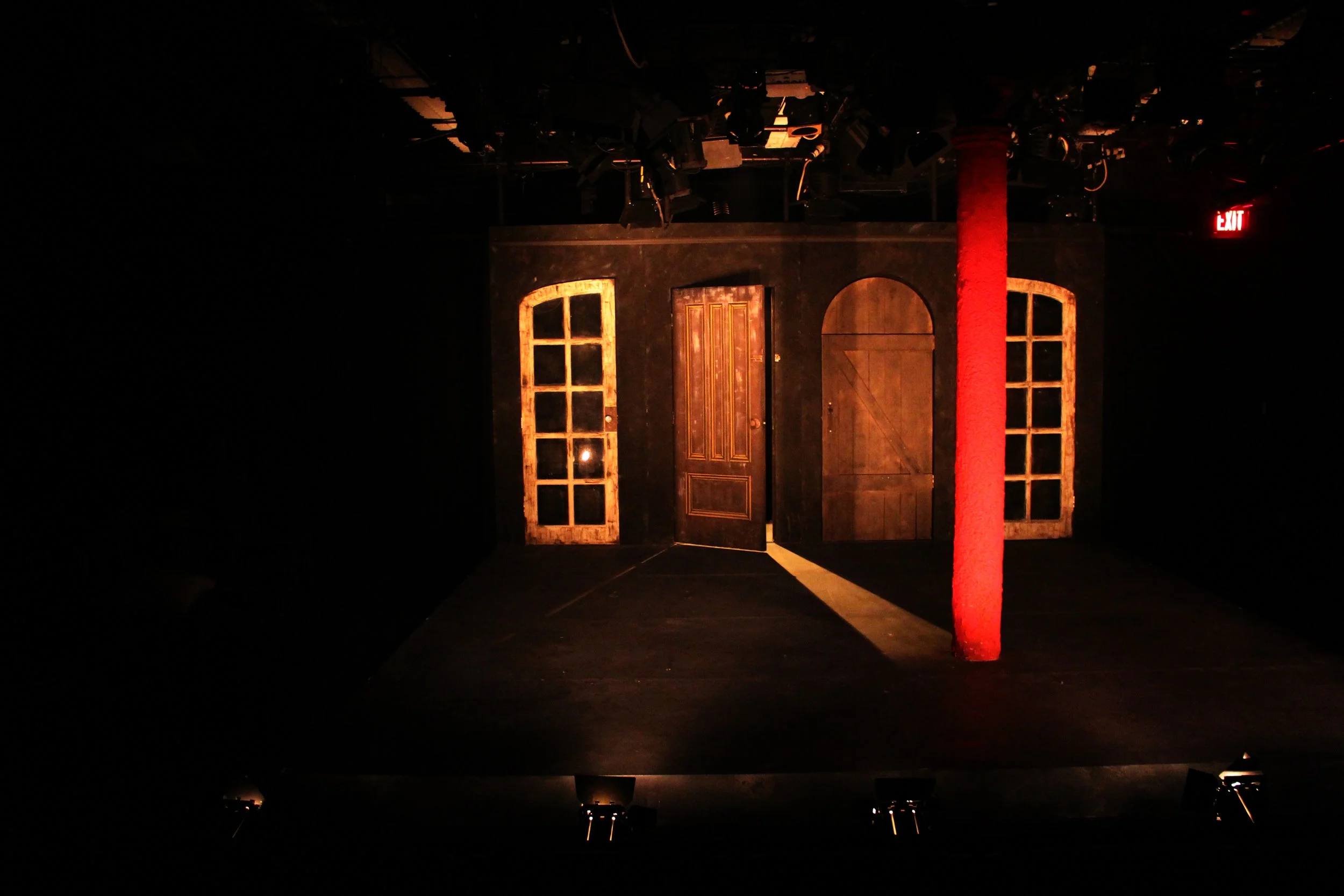  Numerous techniques were used, including creating a concrete texture on risers, plastering the pole, and ageing the doors to create a weathered look. 