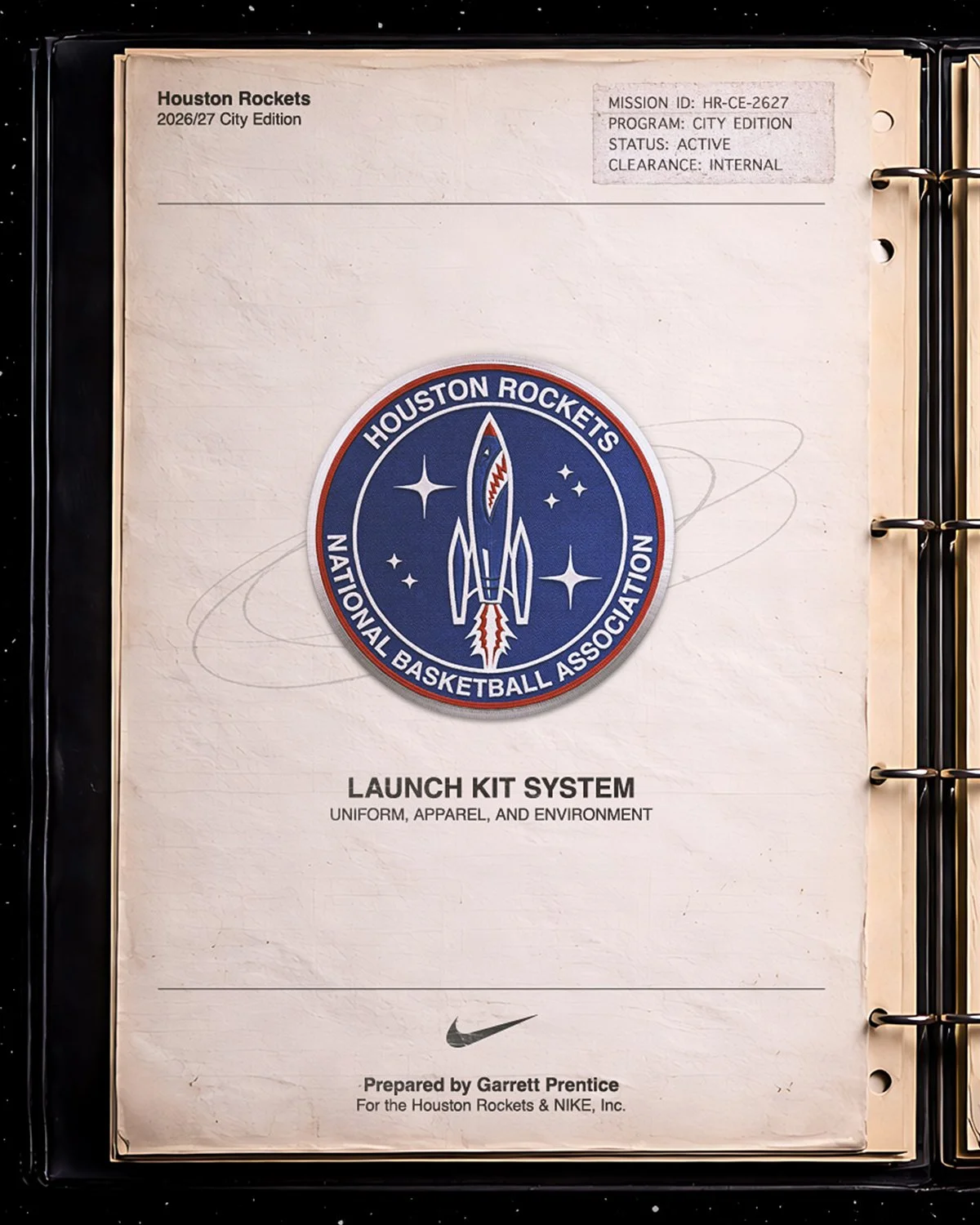 Launch Kit mission binder cover: a Houston Rockets rocket mission patch on aged paper, titled “Launch Kit System: Uniform, Apparel, and Environment.”