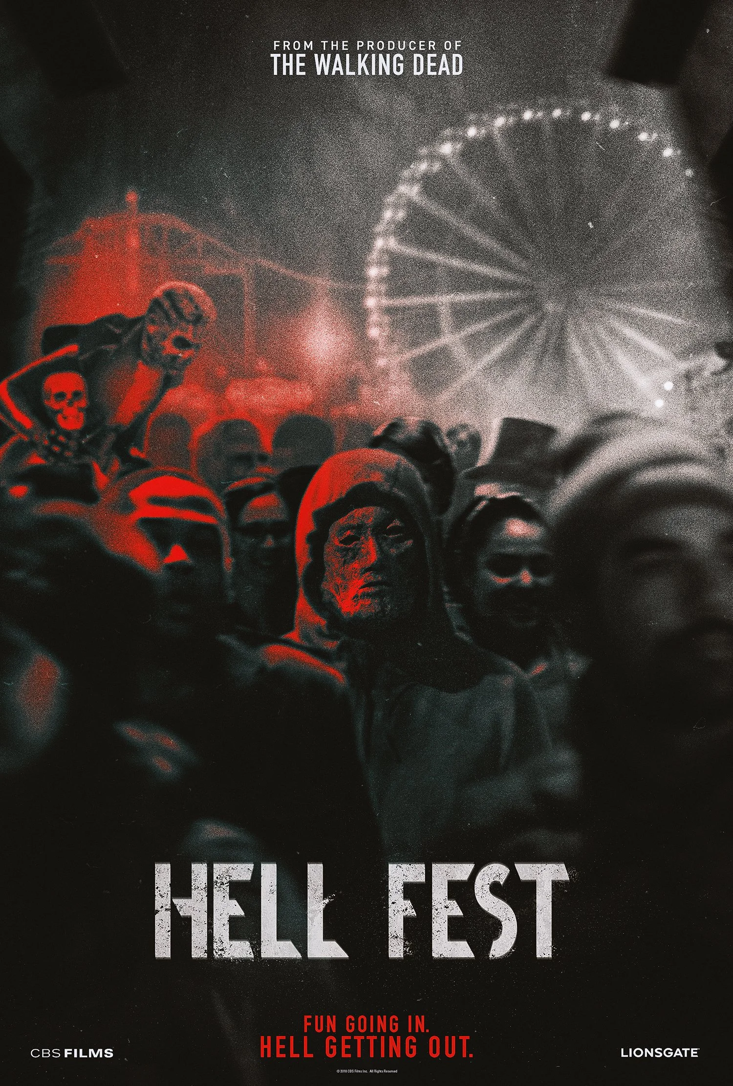 Hell Fest one-sheet, direction A: a masked figure in a hooded crowd under red light, with a Ferris wheel glowing behind.