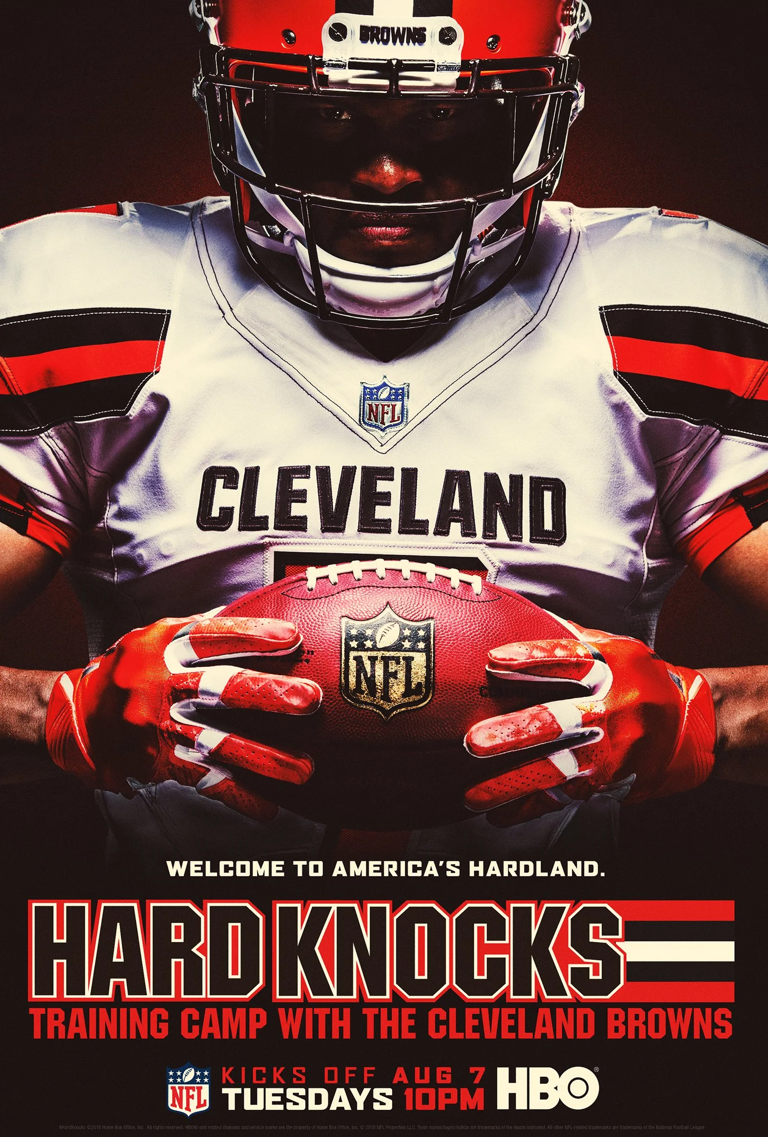 Hard Knocks key art: a Cleveland Browns player in an orange helmet gripping a football, over “Welcome to America’s Hardland.”