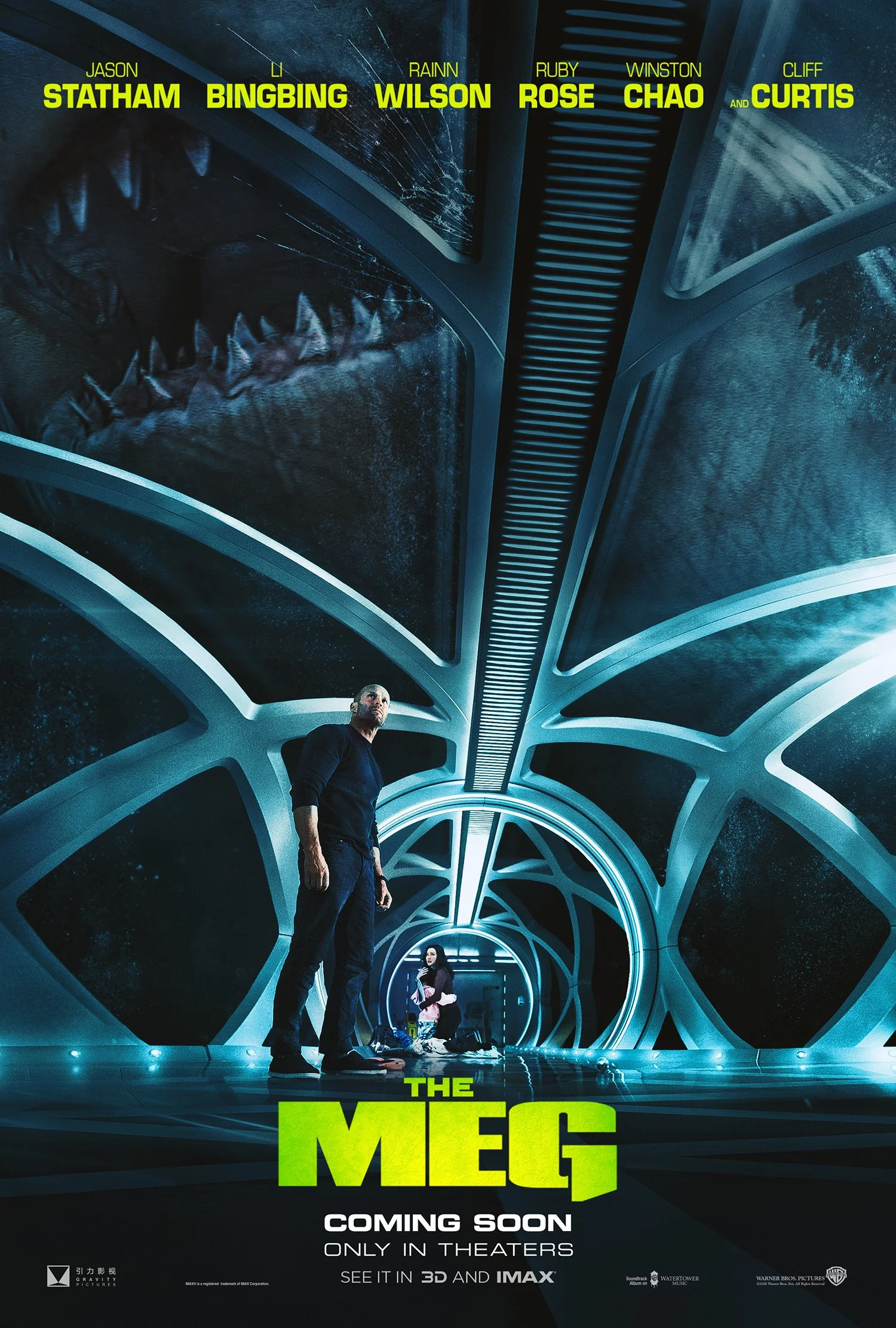 The Meg one-sheet, direction B: Jason Statham standing alone in a glowing underwater glass tunnel, with a shark’s jaws framing the top.