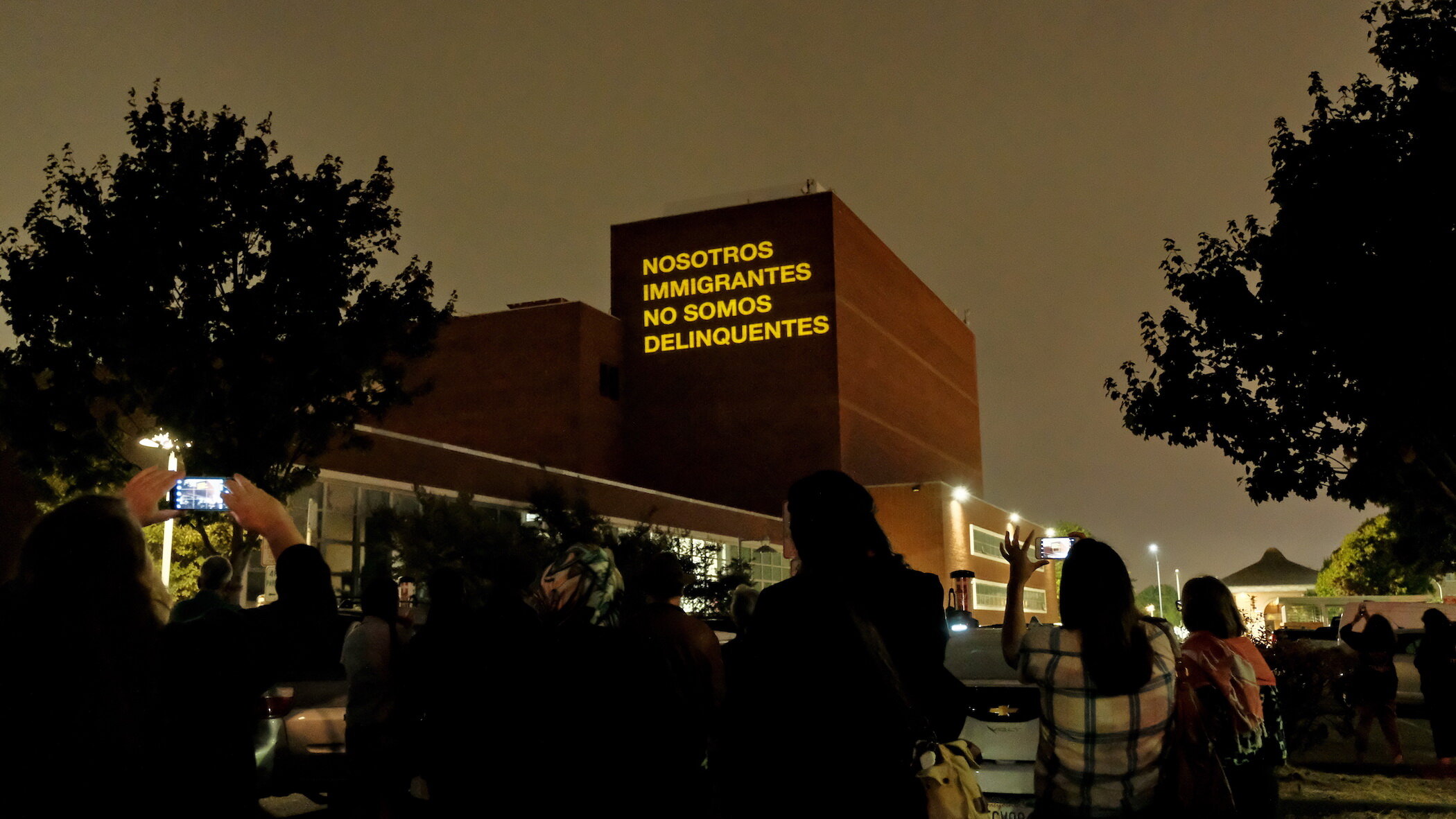 Chan.NosotrosImmigrantes.VideoProjection.Fivestories.2000_2019.JPG