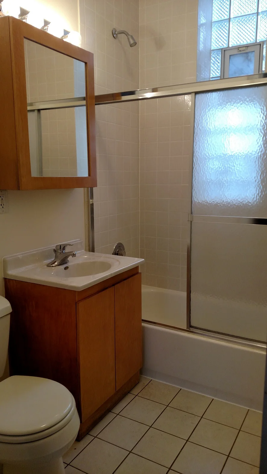 #1R bath - new floor tile and vanity top.jpg