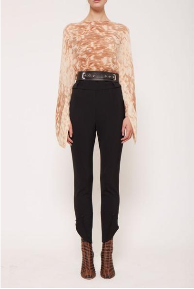 This high-necked silk Earth Data trumpet blouse ($395) with extended trumpet sleeves is ideally paired with slim-fit silk pants. But you can also dress it down for a more casual spin with tapered jeans and a flat or heeled sandal. Whilst it’s ticked in here, it looks even more ravishing hanging out, but just remember to keep the leg very fitted. Refreshingly cool in every sense of the word, it’s a timeless winner that works in both Summer or Winter (just drape a jacket over your shoulders).