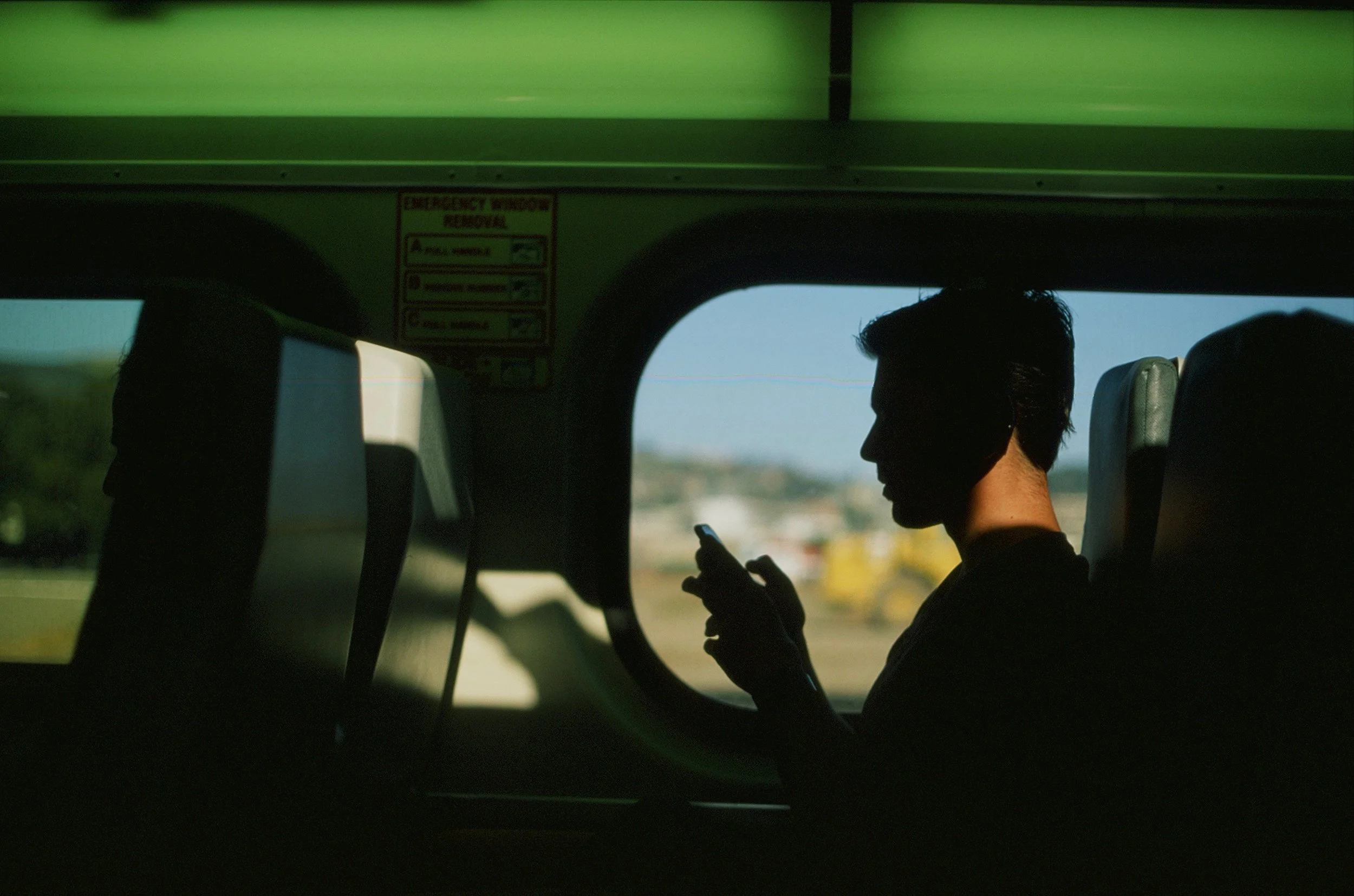 Man commuting to work in Silicon Valley on Caltrain, 2018
