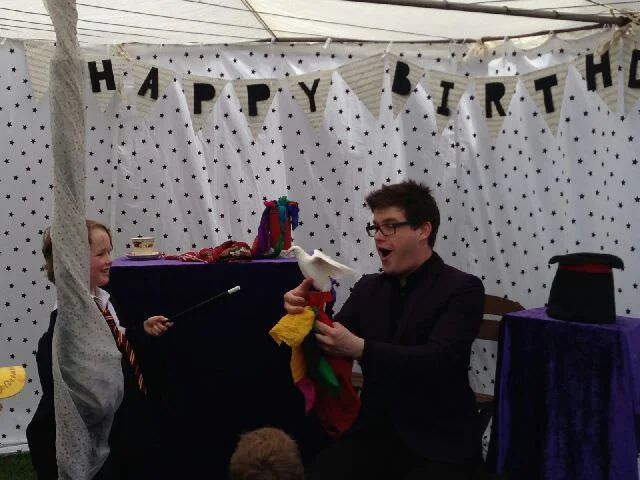 He's hidden behind the marquee poll, but yes that is Harry Potter I'm teaching magic to. 