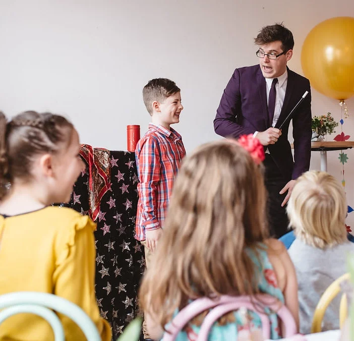 An amazing magic helper getting ready to perform his trick.