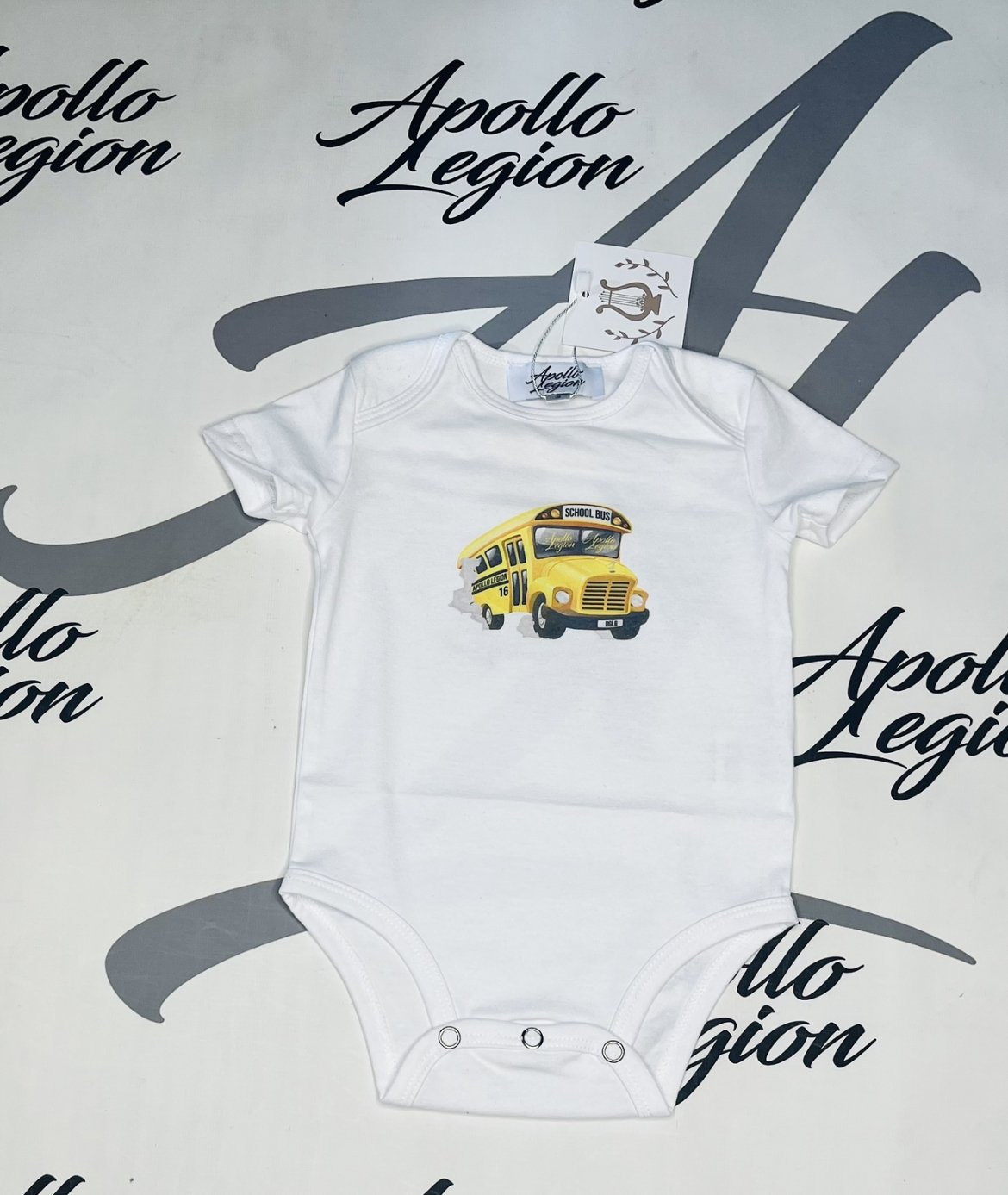 DGLB White Baby Onesie Front.jpeg