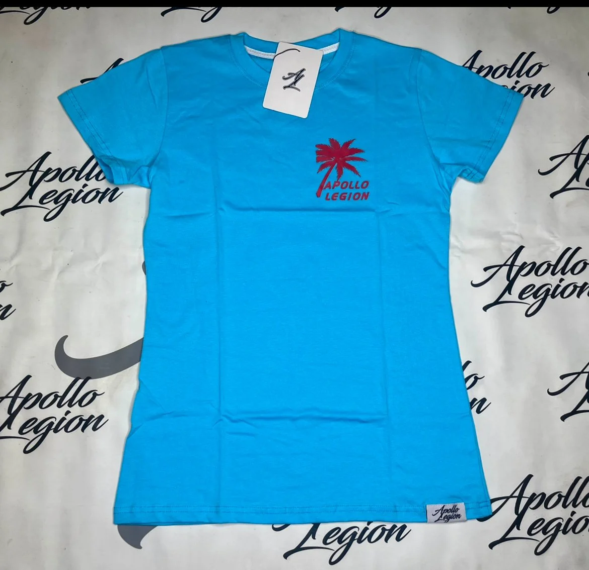 Turquoise Shirt w: Palm Tree (female).jpeg