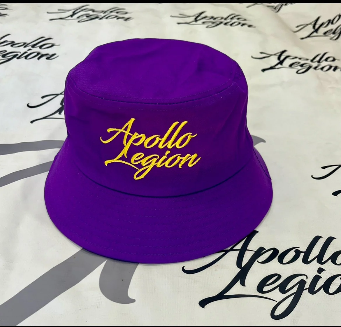 Purple w: Gold Bucket Hat.jpeg