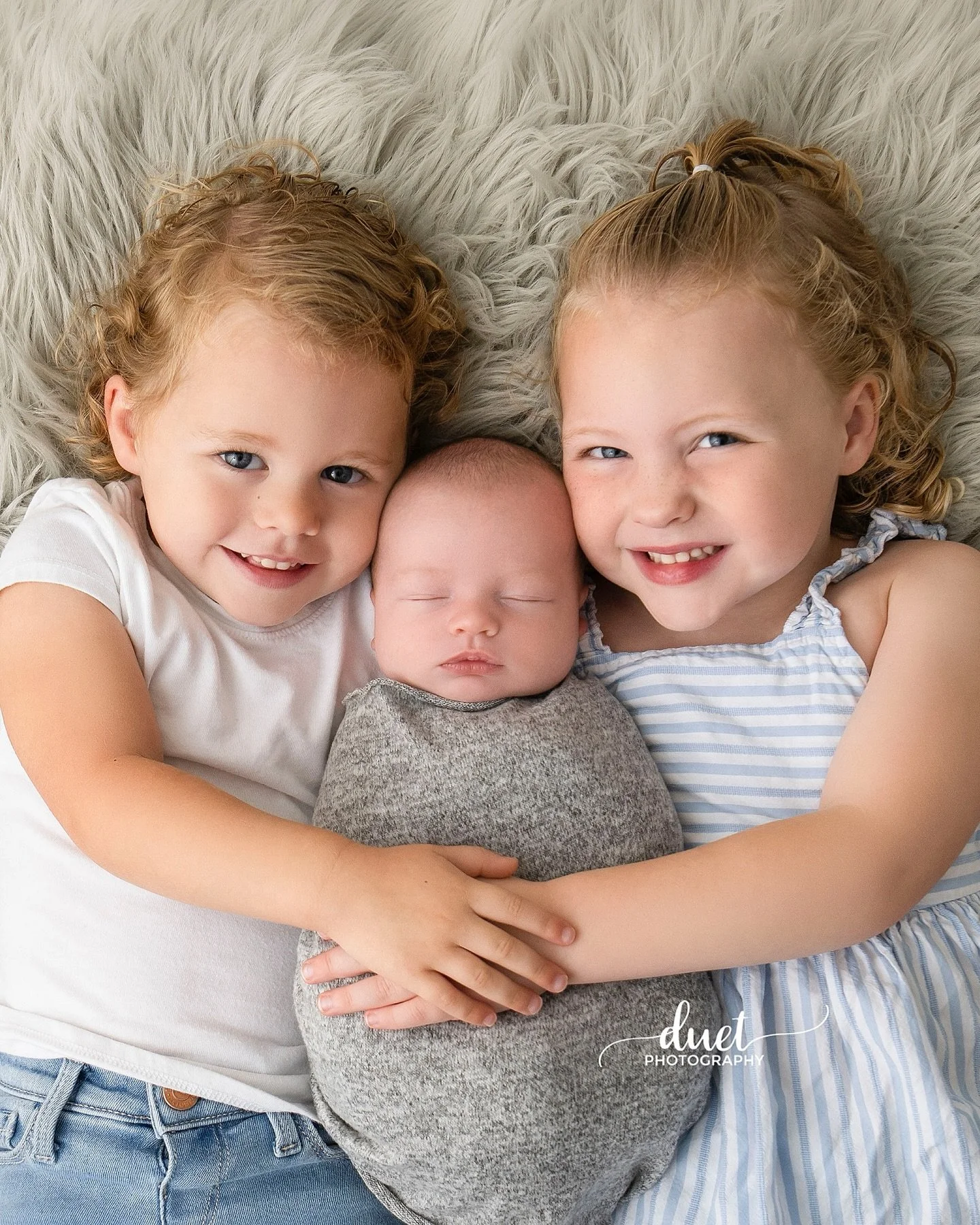 You guys...one of my favorite families welcomed their 3rd baby into the world! I have been fortunate enough to capture all three of these precious children as newborn babies. The girls absolutely adore their new baby brother and are just the sweetest