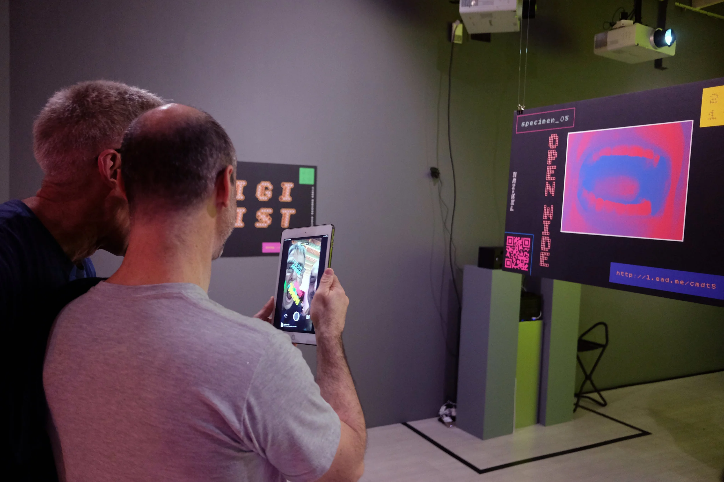 Visitors experimenting with augmented reality face filters as part of Haikel’s DIGIType.