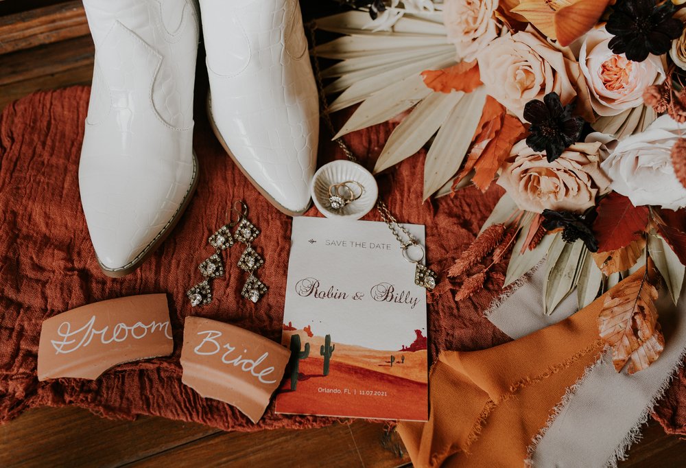  Beautifully captured moment at Robin and Billy's wedding at The Acre, Orlando, showcasing the venue's unique charm and the couple's travel-themed, bohemian style, by professional wedding photographer, Sufia Huq Portraits. 