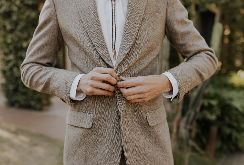  Beautifully captured moment at Robin and Billy's wedding at The Acre, Orlando, showcasing the venue's unique charm and the couple's travel-themed, bohemian style, by professional wedding photographer, Sufia Huq Portraits. 