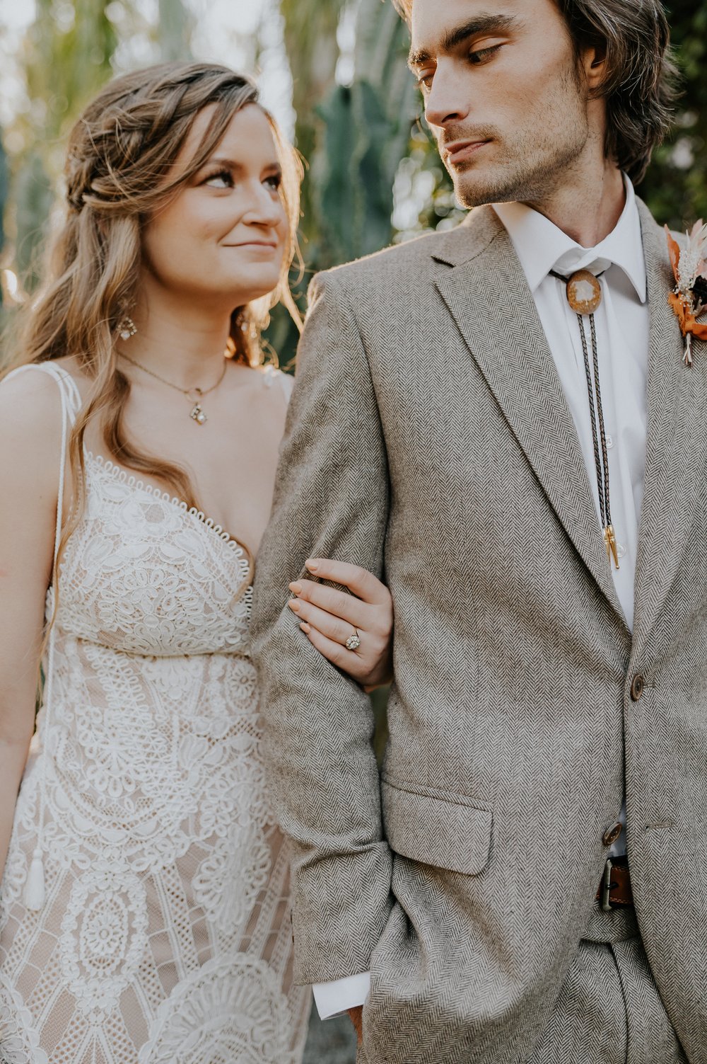  Beautifully captured moment at Robin and Billy's wedding at The Acre, Orlando, showcasing the venue's unique charm and the couple's travel-themed, bohemian style, by professional wedding photographer, Sufia Huq Portraits. 