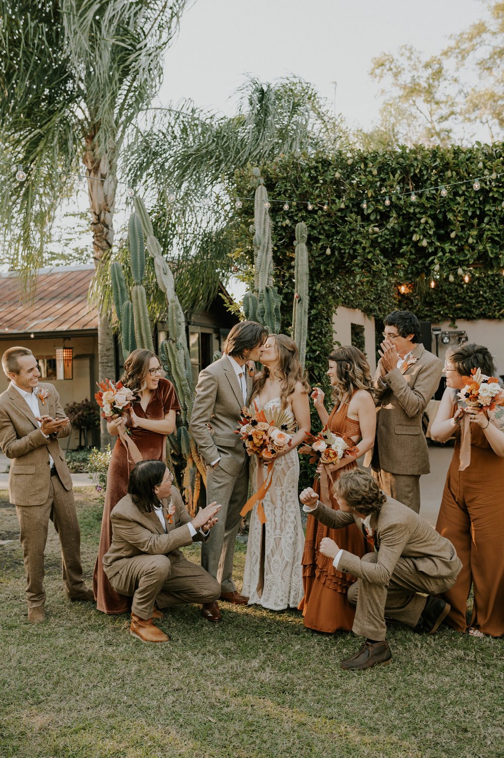  Beautifully captured moment at Robin and Billy's wedding at The Acre, Orlando, showcasing the venue's unique charm and the couple's travel-themed, bohemian style, by professional wedding photographer, Sufia Huq Portraits. 