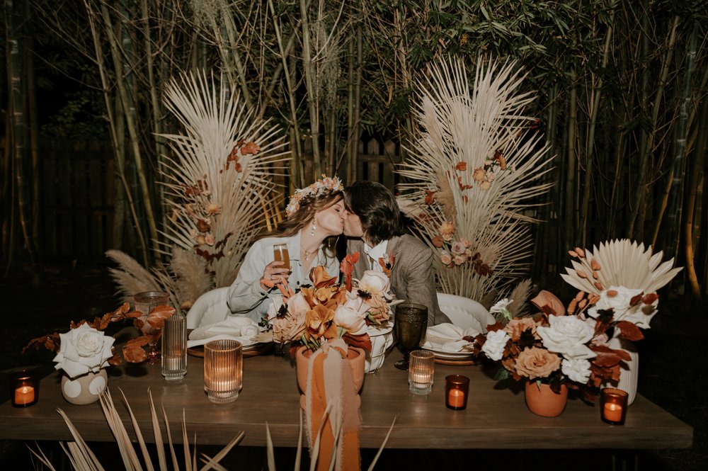  Beautifully captured moment at Robin and Billy's wedding at The Acre, Orlando, showcasing the venue's unique charm and the couple's travel-themed, bohemian style, by professional wedding photographer, Sufia Huq Portraits. 