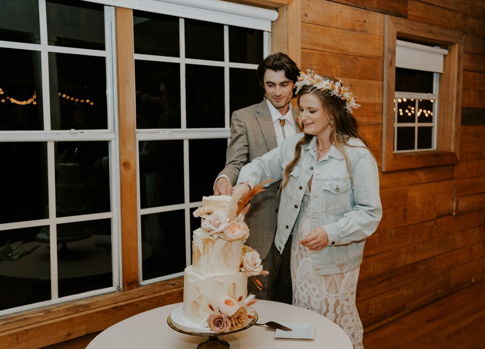  Beautifully captured moment at Robin and Billy's wedding at The Acre, Orlando, showcasing the venue's unique charm and the couple's travel-themed, bohemian style, by professional wedding photographer, Sufia Huq Portraits. 