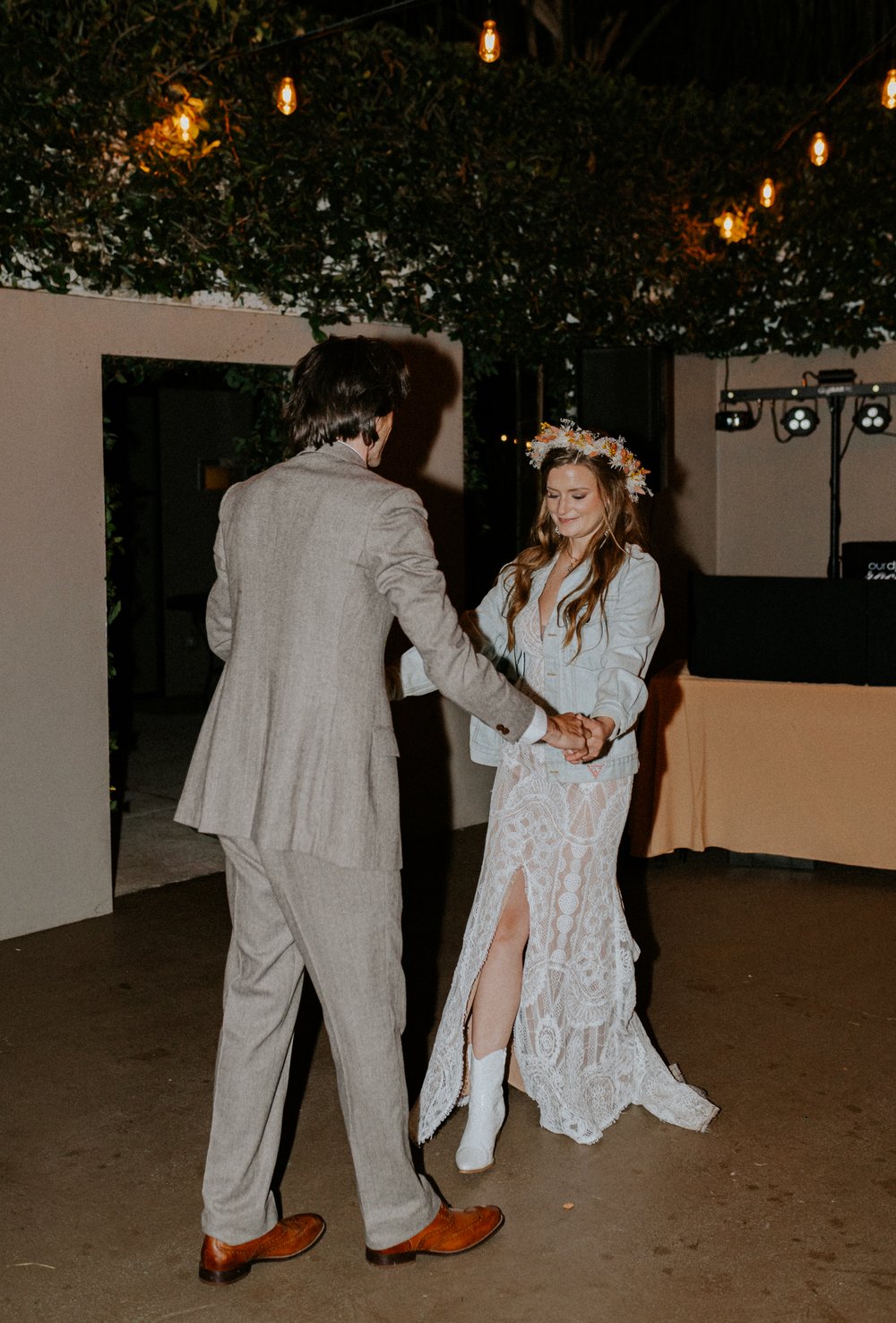  Beautifully captured moment at Robin and Billy's wedding at The Acre, Orlando, showcasing the venue's unique charm and the couple's travel-themed, bohemian style, by professional wedding photographer, Sufia Huq Portraits. 