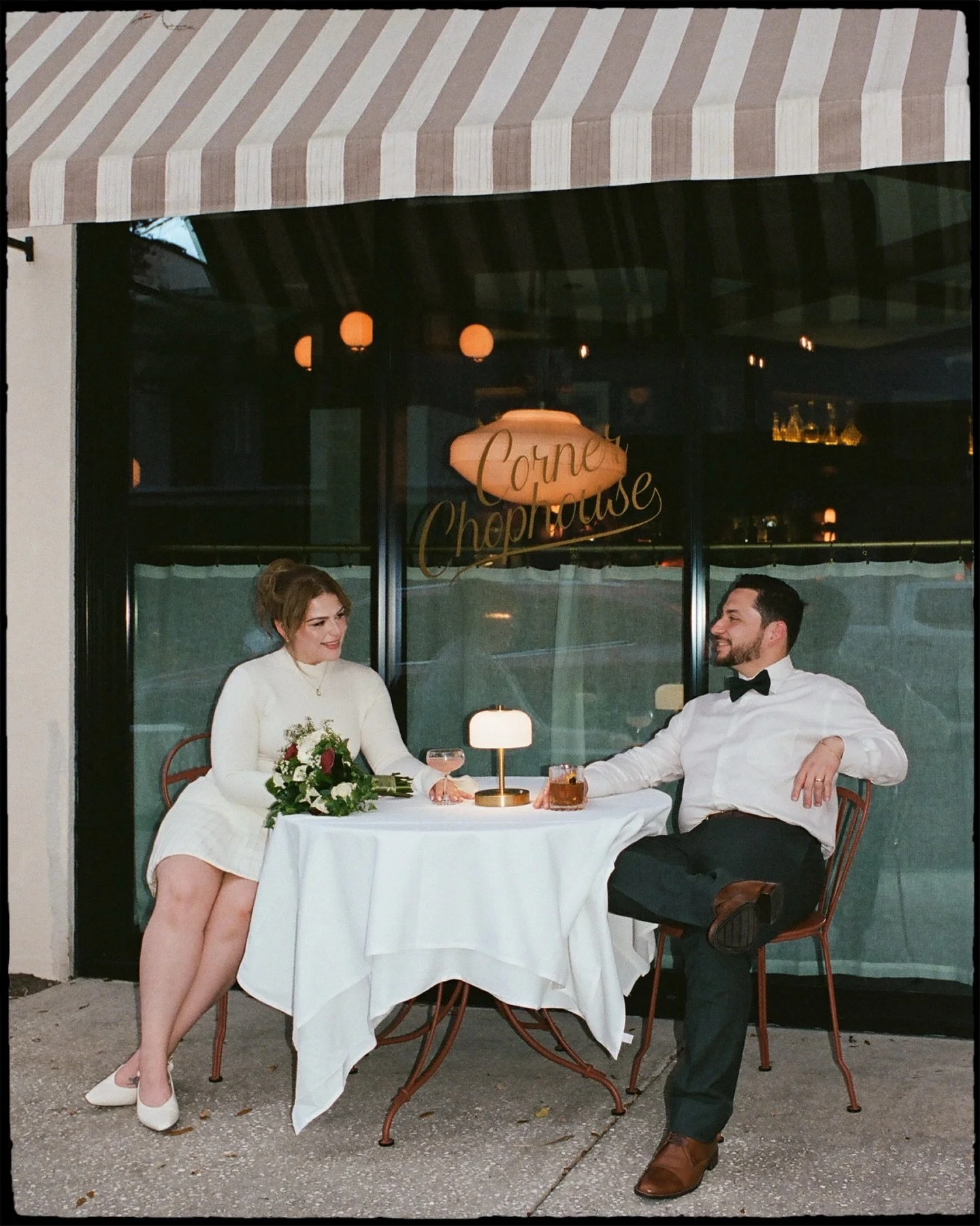 Susie &amp; Christian, Winter Park Elopement&mdash; on film 🎞️

A quiet little &ldquo;just us&rdquo; kind of day.
Their best girl Daphne by their side, a close friend marrying them under ivy-covered arches, and a slow toast after at @cornerchophouse