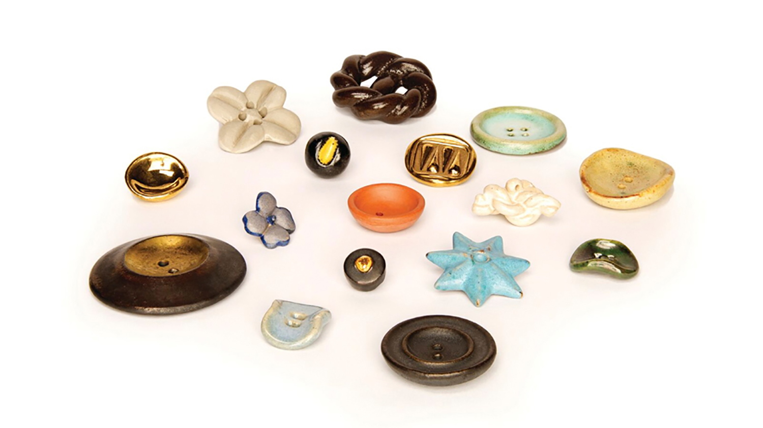  Buttons   by Lucie Rie  