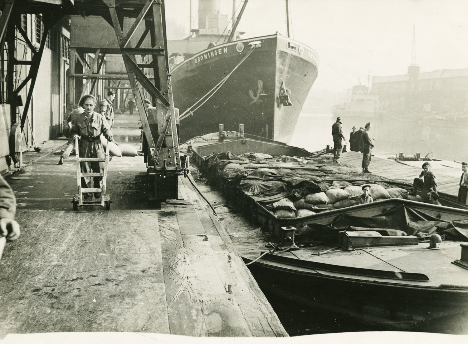 The army handling dock cargo, October 1945