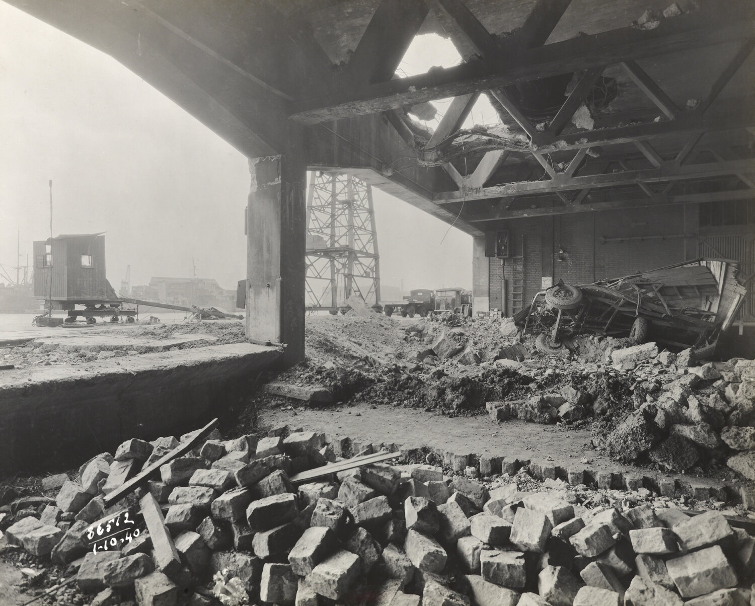 Air raid damage to Royal Albert Dock sheds, October 1940