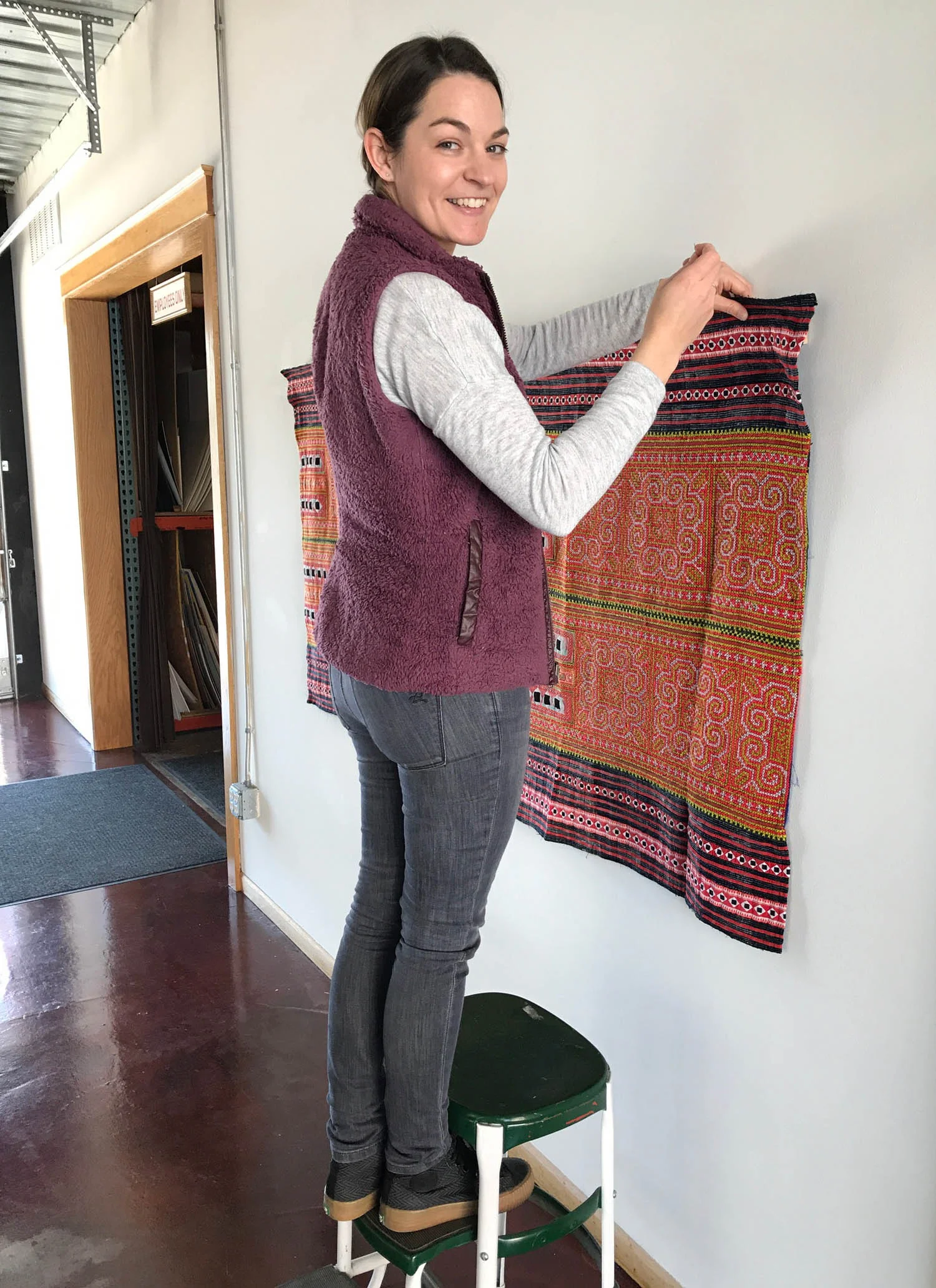 Sewing a pocket on a tapestry so it can hang on the wall