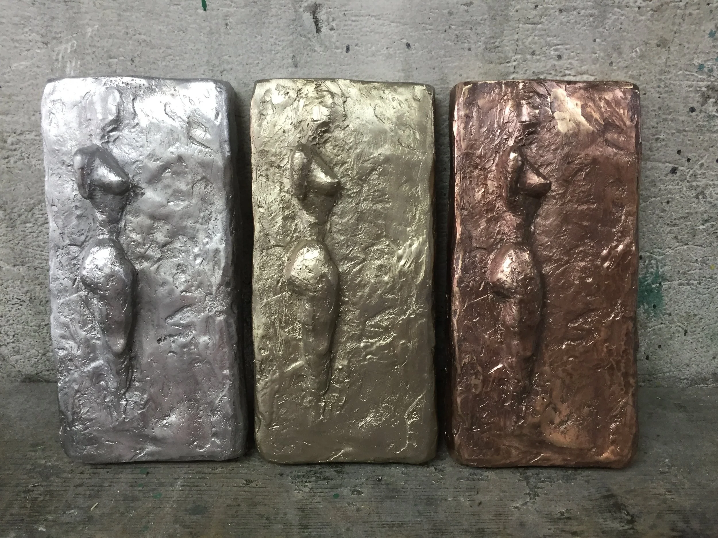abstract nude trilogy - relief aluminium, white bronze, bronze
