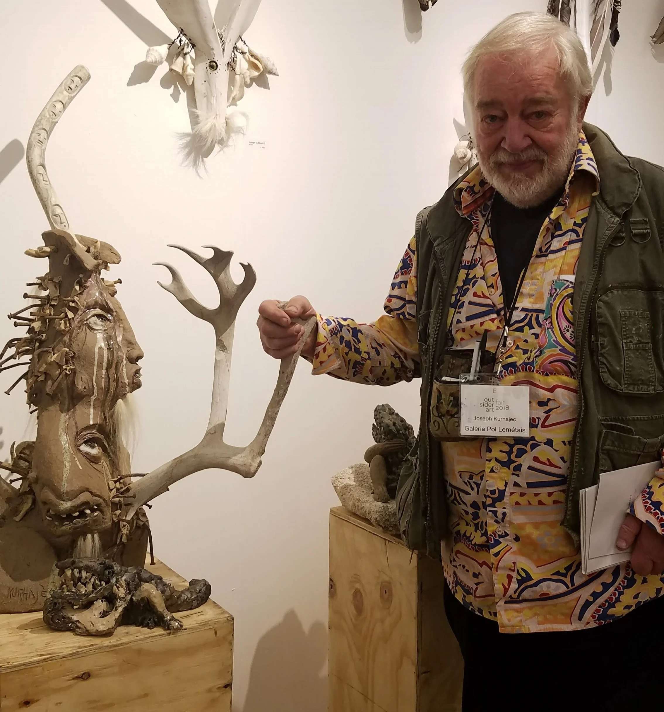 Joseph Kurhajec with his sculpture