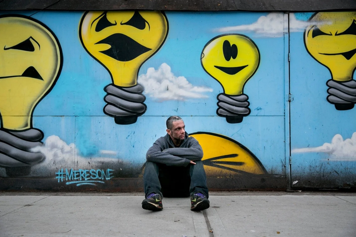 Jonathan Cohen, a graffiti artist who came to an agreement with Jerry Wolkoff to allow artists to paint at 5Pointz, in front of one of his paintings in Brooklyn. “A federal judge said that the act of lettering is a valid art,” he said. “That’s amazing, that’s groundbreaking.” (Credit Sam Hodgson for The New York Times)