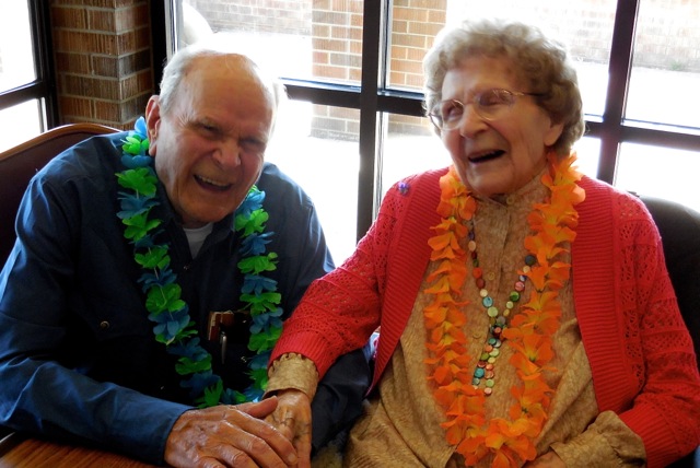 Leo sharing a joke with his sister at her 100th birthday. She survives him at 103.