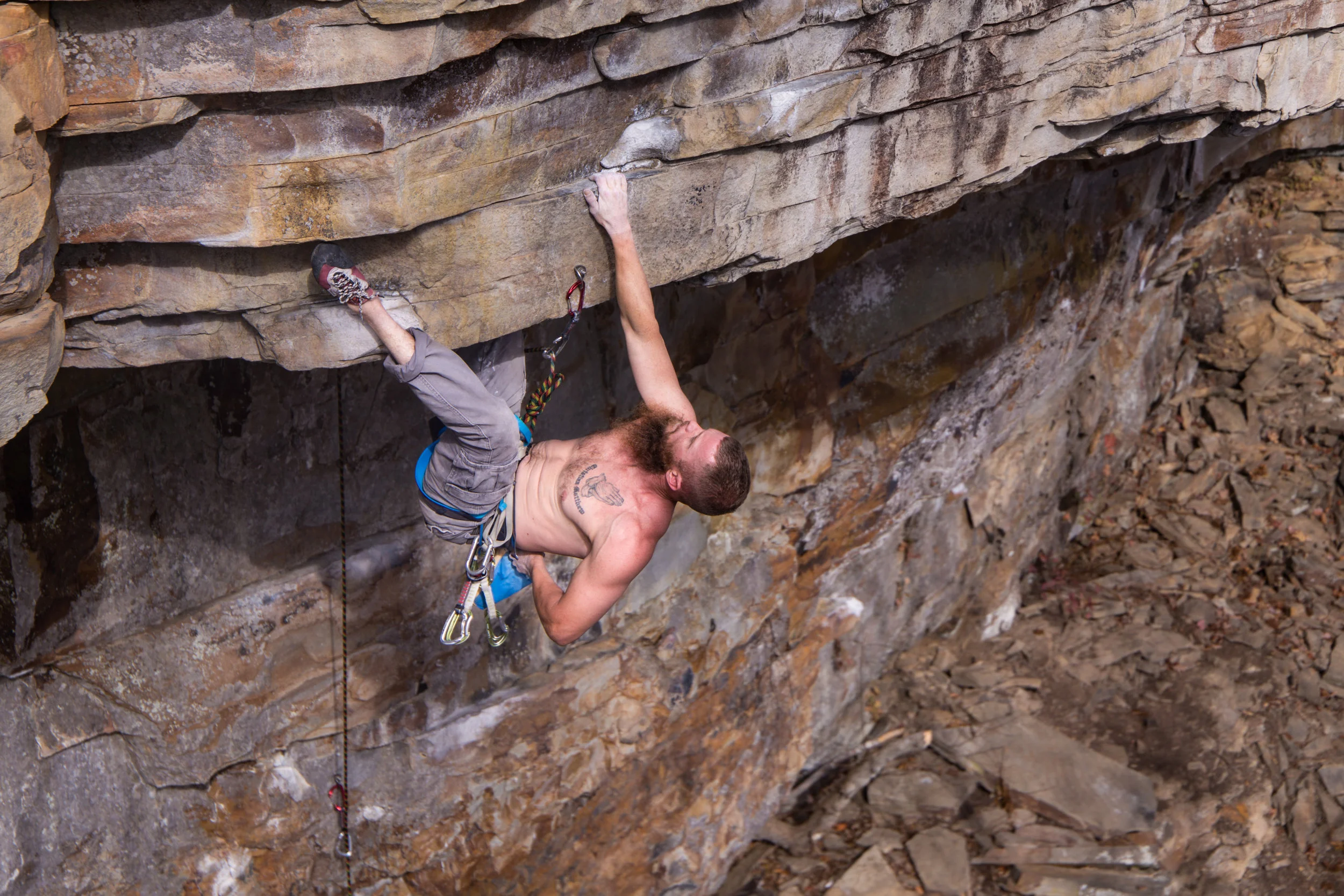 Matt Meister refuels his chalk supply before tackling the anchors on Outpatient in Little River Canyon.