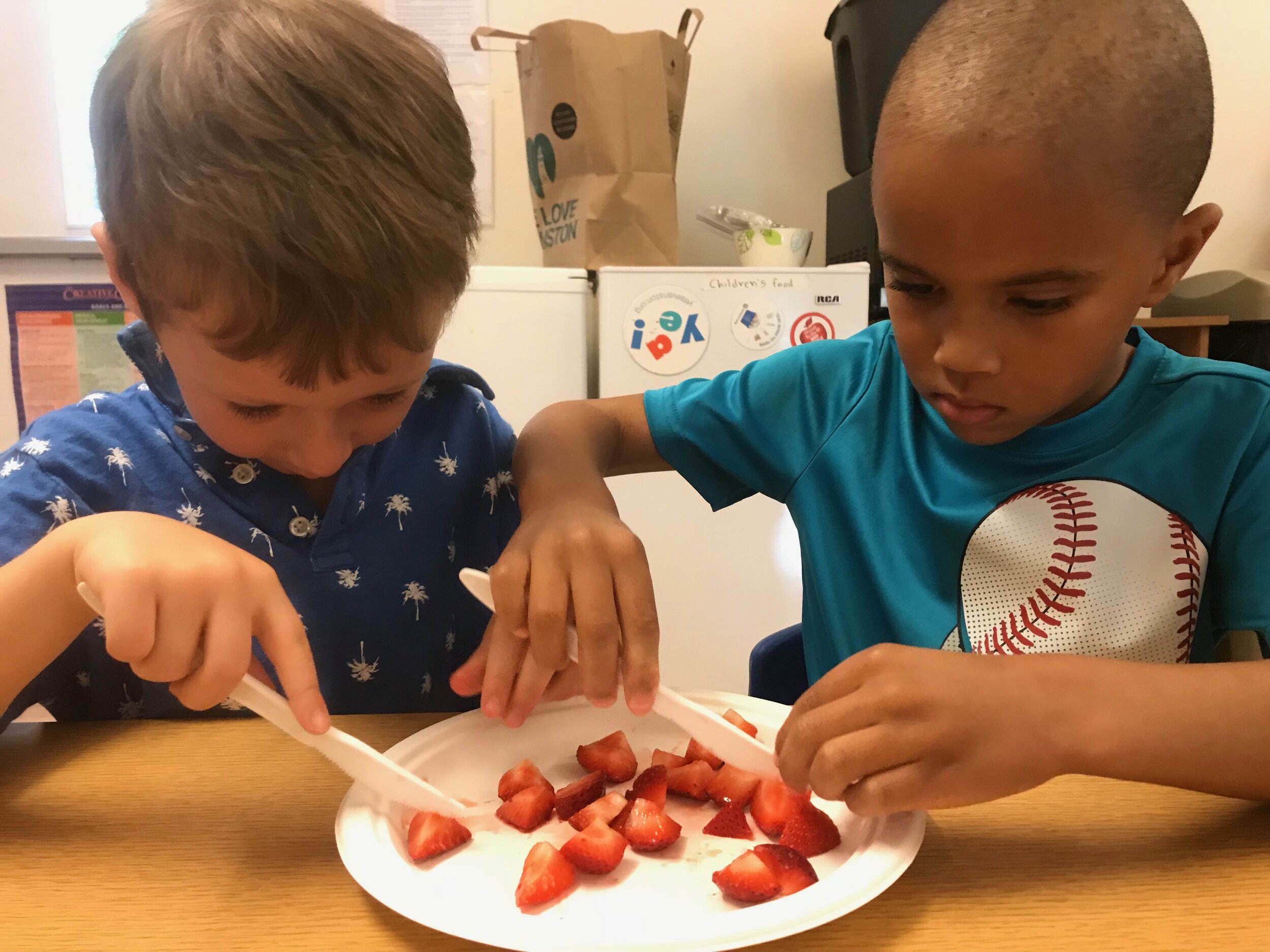 Friends cutting strawberries1.JPG
