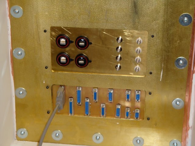 Buckner Lab/MRI facility: Patch panel maintains shielding while allowing cabling to reach into the scan area.