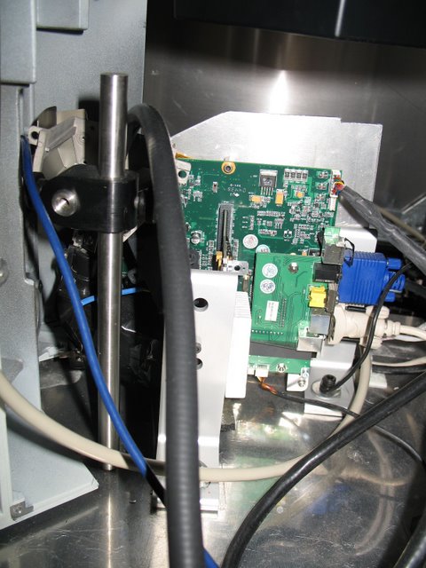 Meister Lab: The same microscope from behind. The trans-illumination lamp has been removed and replaced with a digital projector. This allows patterned images to be presented to the retain while cellular responses are recorded. Incompatible E.M.F. sources have been removed or modified.