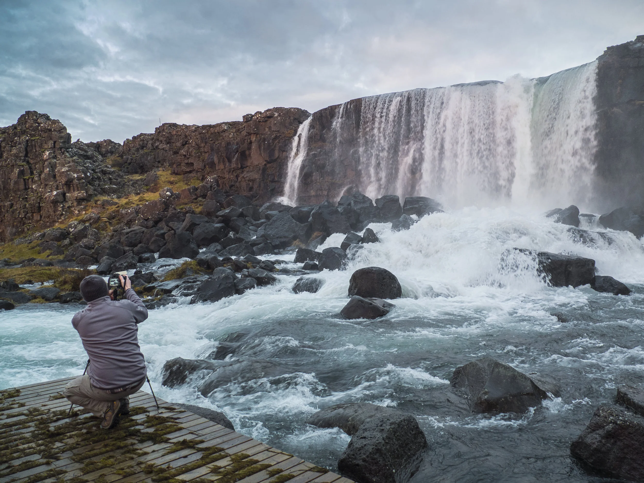 Photographing a waterfall in Iceland, 2016. (Photo by Alison Reaves)