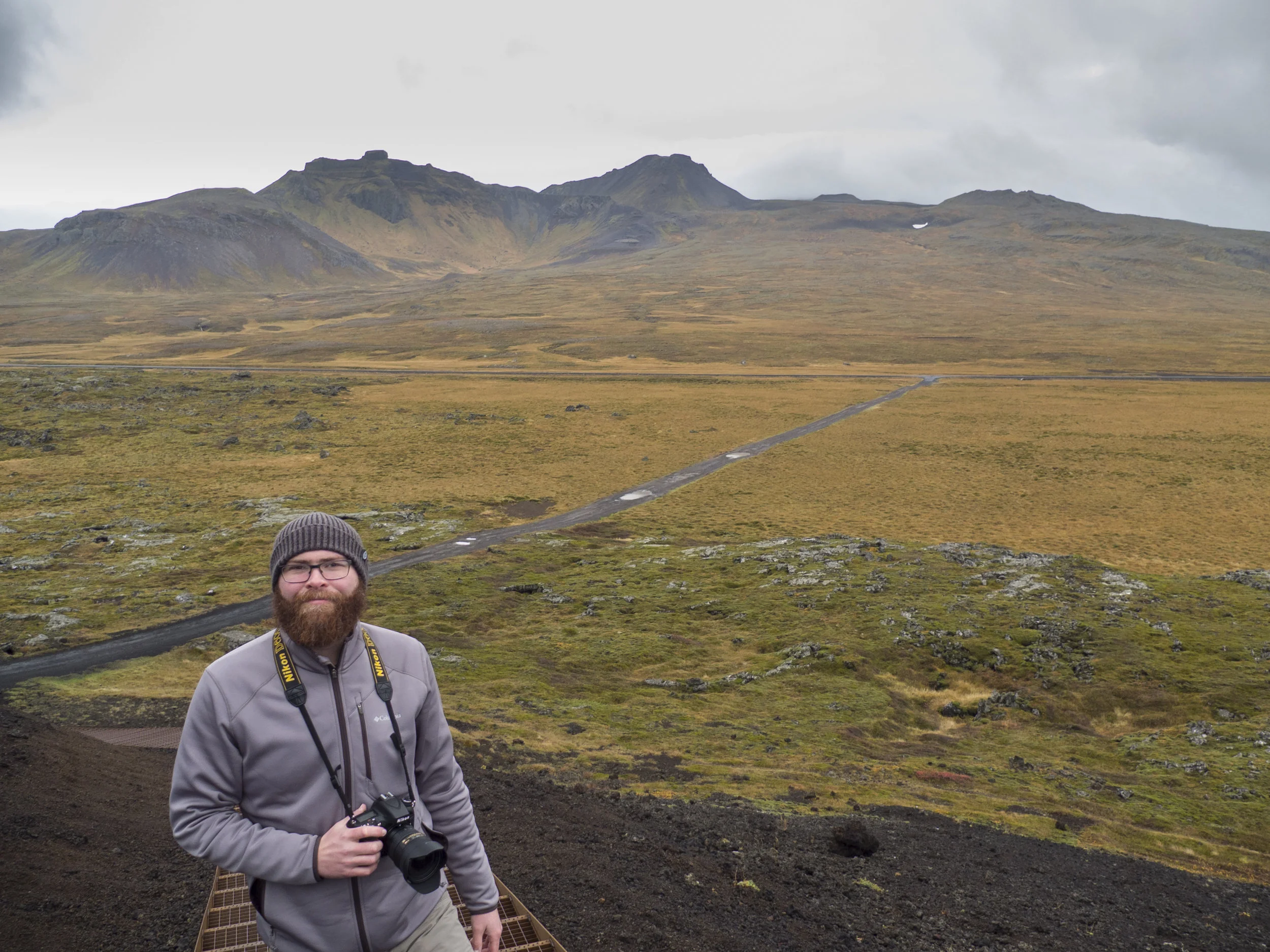 Climbing an iron spiral staircase to the top of a volcanic crater in Iceland, 2016. We explored the Snaefellsness Peninsula at our own pace by rental car instead of paying for one of the expensive tours. (Photo by Alison)