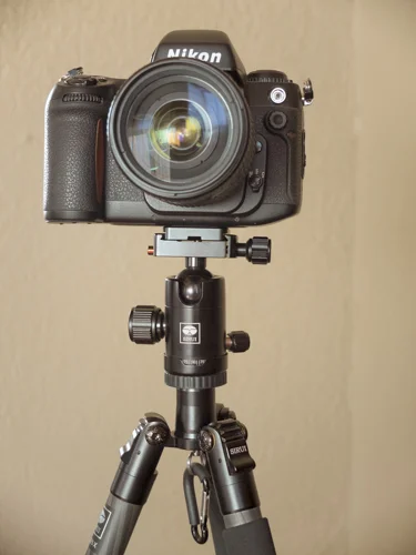 w/ Nikon F100 attached