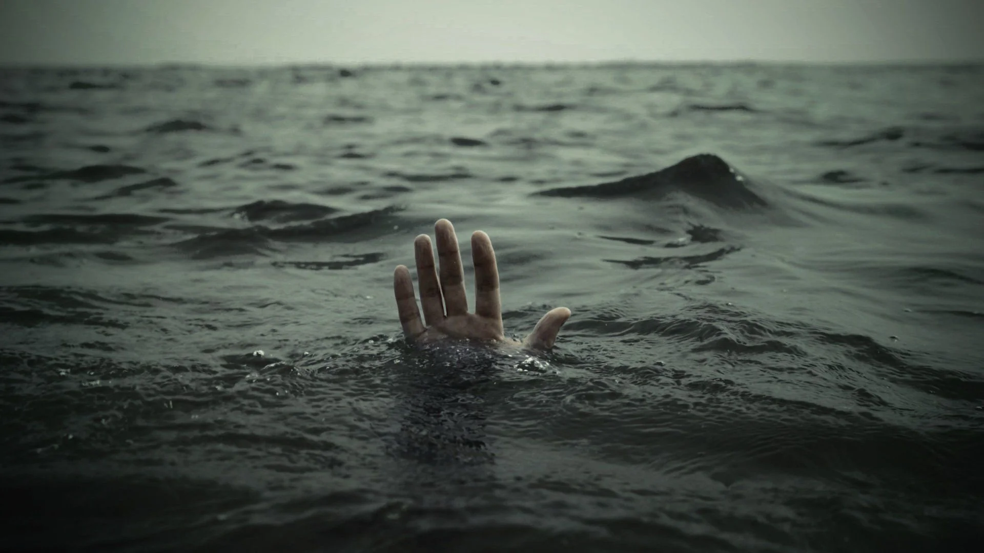 Hands-Drowning-Sea.jpg
