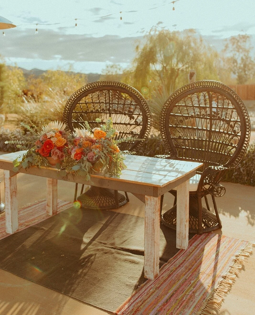 Our signature sweetheart table + peacock chairs. Included in our standard venue rental fee 🖤 photo: @andieaveryphoto