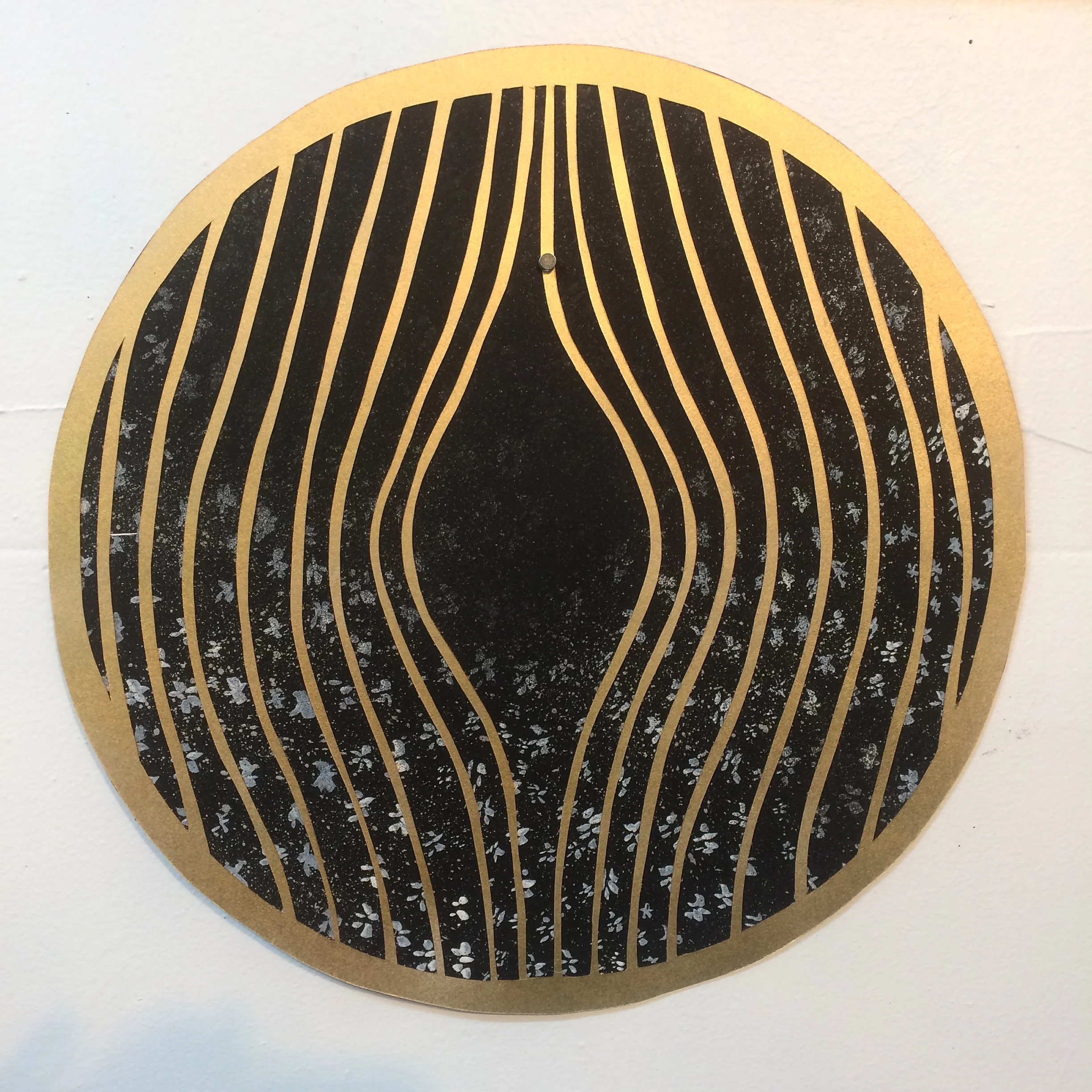10"x10" Gold paper cutout on painted paper back-ground.