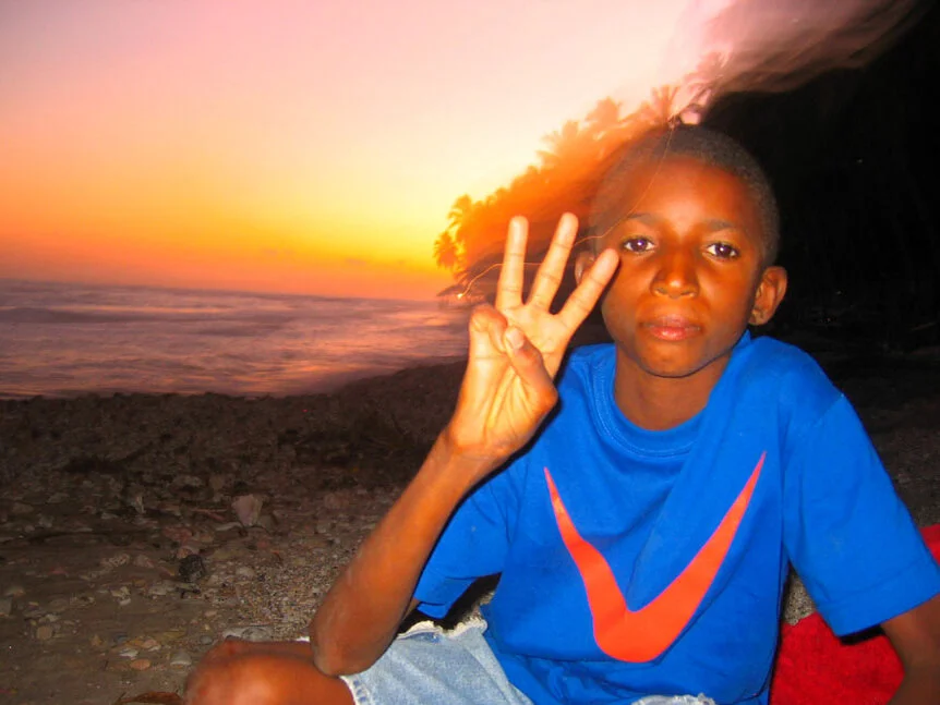 Haiti 2006 Fetzon FFJ 3 sign at sunset 2.jpg