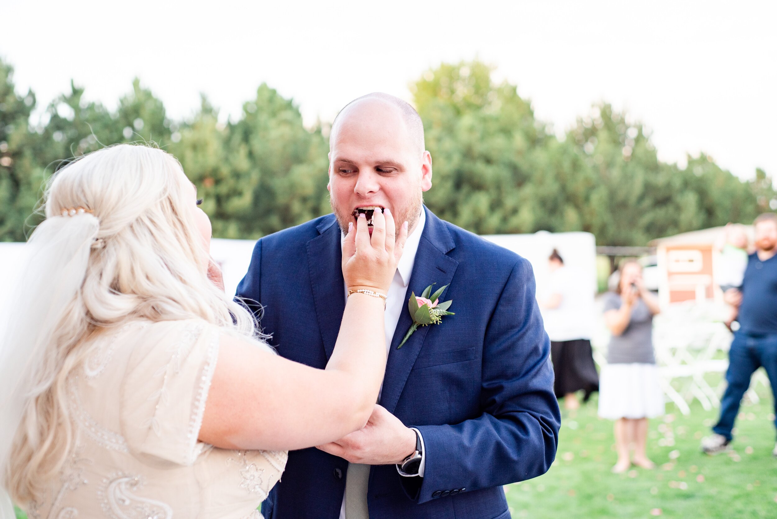 Bride & Groom Cutting Cake - Tri Cities Wedding Photographer - Morgan Tayler Photo & Design - Tri Cities Washington Backyard Wedding