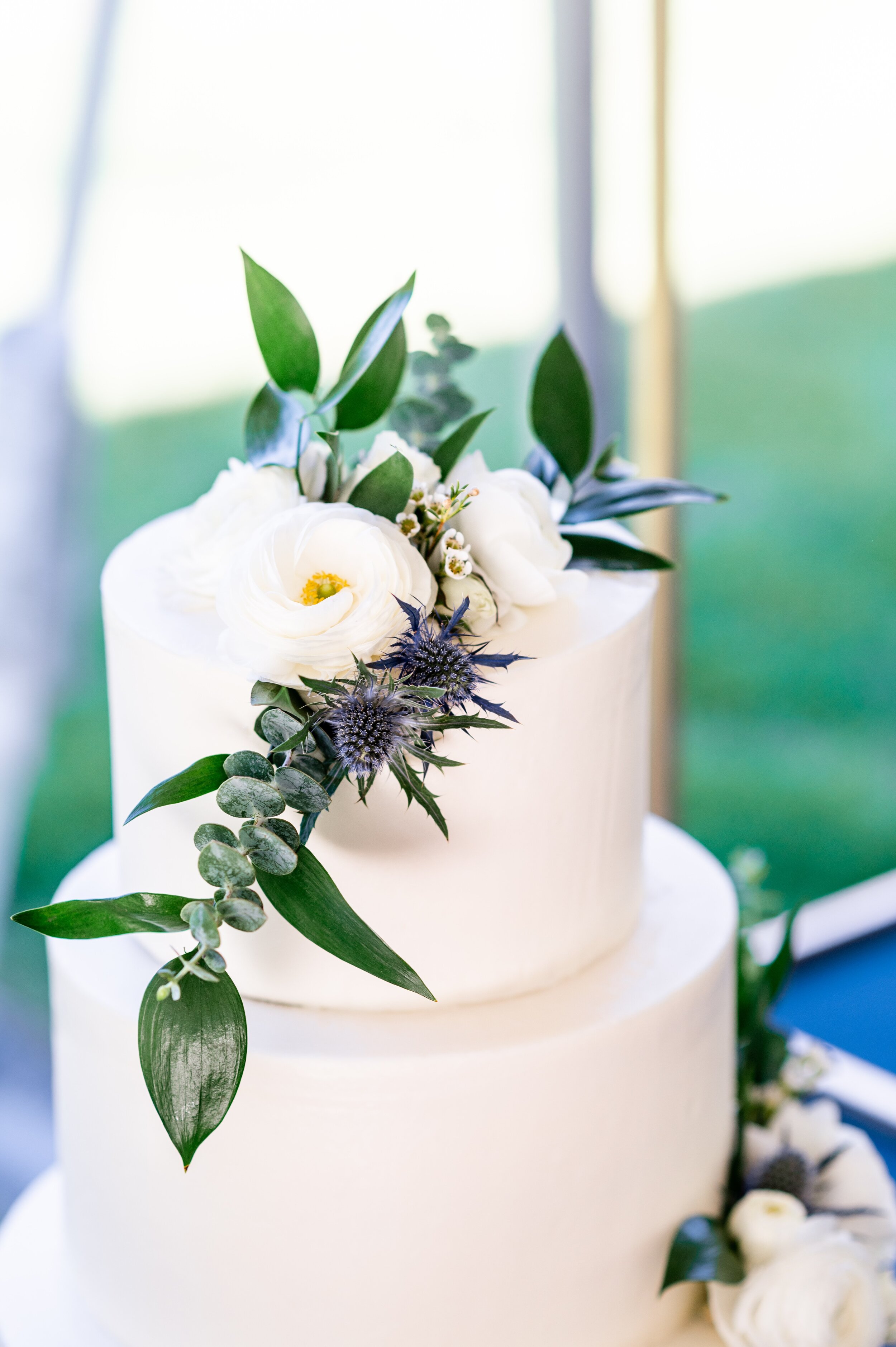 White Wedding Cake with Flowers and Gold Arbor - Harper Road Floral - Cake By Alicia - Promise Gardens Pasco Wedding Venue - Tri Cities Wedding Photographer - Morgan Tayler Photo &amp; Design