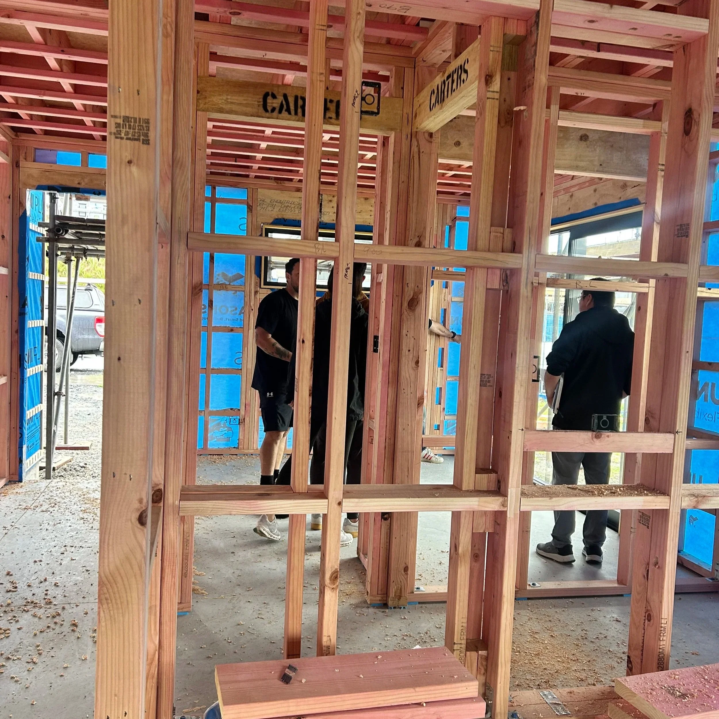 Maddren Homes client site walkthrough with specialist trades during construction of an Auckland home