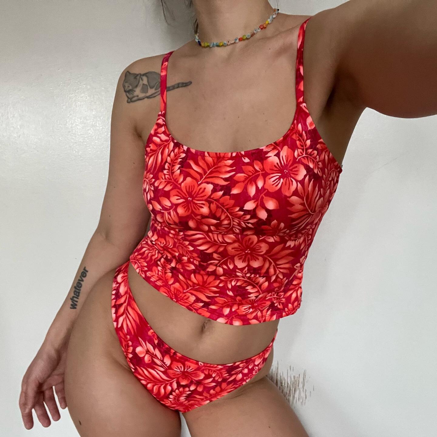 🦞90s tropical tankini in juicy blood orange. Size marked 12 but fits like a 6/8 medium &bull; $48 &bull; dm to purchase