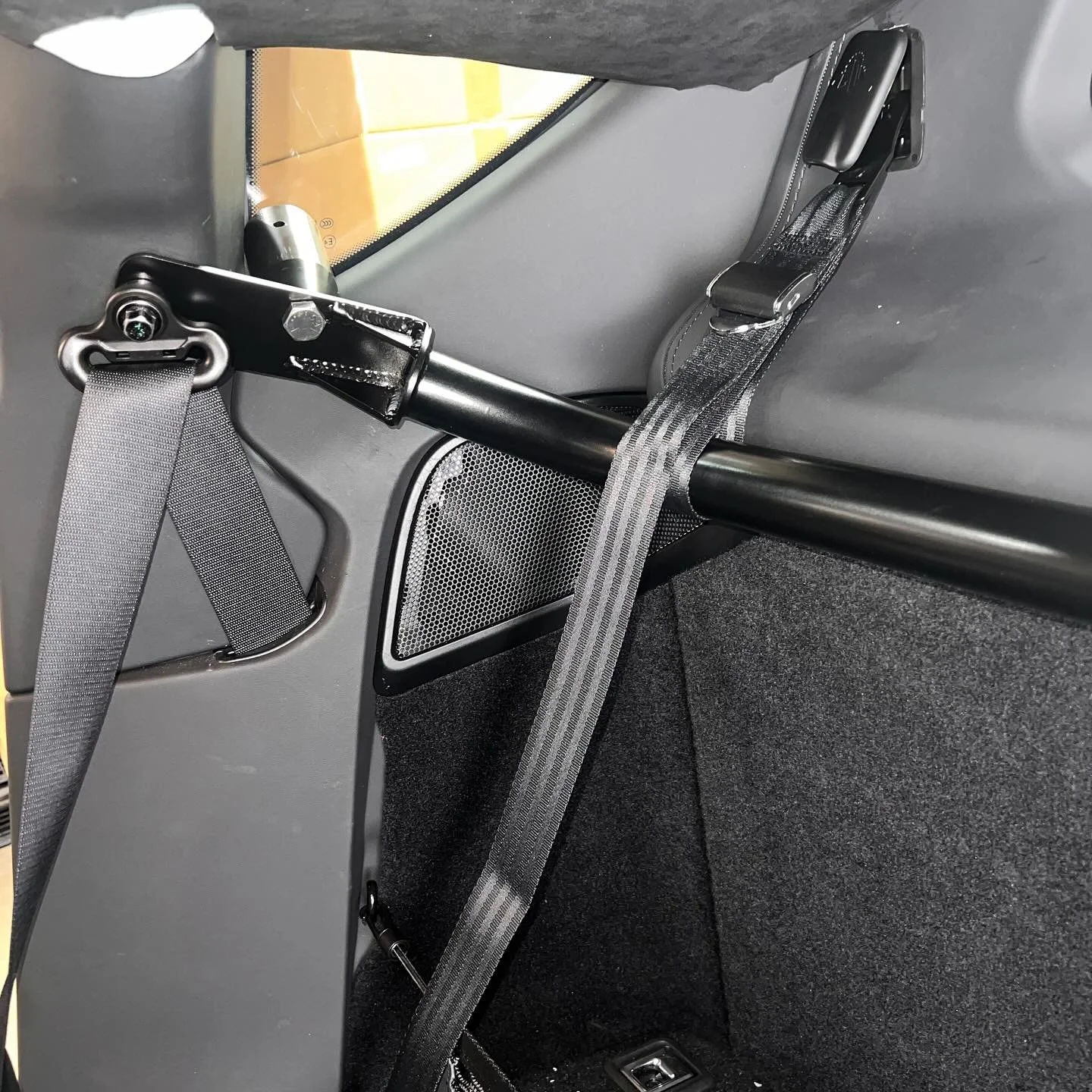 Our new QUADloc Harness bar for the Lotus Emira features several engineered innovations.  The primary anti-rotation device is a Delrin rod that features cam action for ideal fitment to the B-pillar.  They are bolted to the harness bar using LH thread